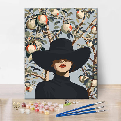 Femme au chapeau noir parmi des branches de poirier – Peinture par numéros