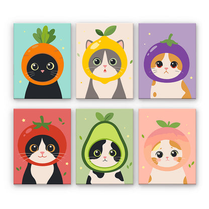 Chats en costumes de fruits