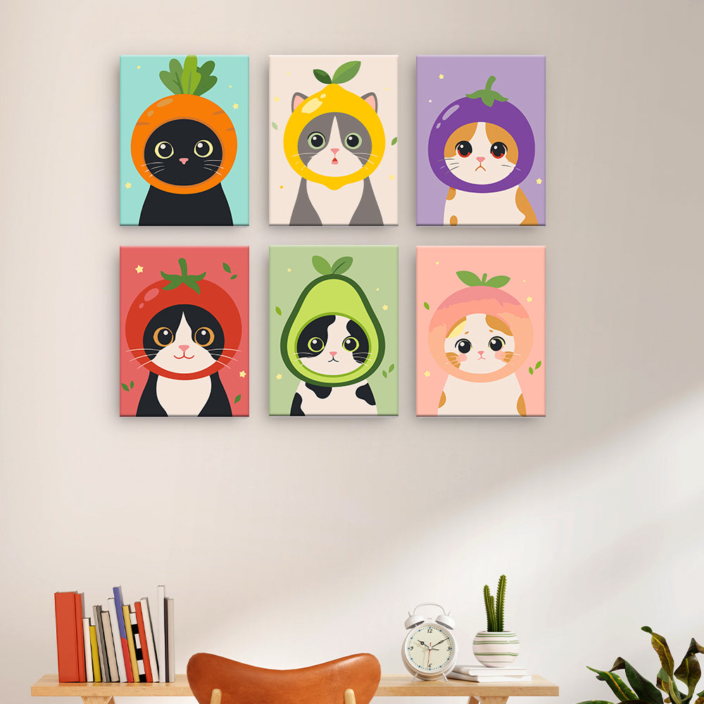 Chats en costumes de fruits